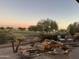 Relaxing water feature with pond and landscaping at sunset at 22455 N 55Th St, Phoenix, AZ 85054