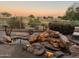 Serene backyard water feature with beautiful sunset view at 22455 N 55Th St, Phoenix, AZ 85054