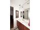 Bathroom with vanity, sink, and large mirror at 22455 N 55Th St, Phoenix, AZ 85054