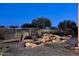 Serene water feature with a waterfall, creating an oasis-like atmosphere in the backyard at 22455 N 55Th St, Phoenix, AZ 85054