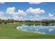 Golf course with lake reflecting the sky at 22455 N 55Th St, Phoenix, AZ 85054