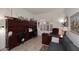 Home office with built-in cabinetry and ample workspace at 22455 N 55Th St, Phoenix, AZ 85054