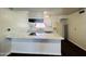 Bright kitchen with white cabinets and marble countertops at 2814 N 55Th Ave, Phoenix, AZ 85035