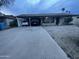 House exterior featuring carport and driveway at 2814 N 55Th Ave, Phoenix, AZ 85035