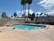 Community pool with volleyball net at 312 S Emerald Dr, Apache Junction, AZ 85119