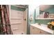 Bathroom shower with shelves and white tile at 312 S Emerald Dr, Apache Junction, AZ 85119