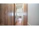 Clean hallway with wood flooring leading to bedrooms at 312 S Emerald Dr, Apache Junction, AZ 85119