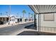 Sun-drenched mobile home community with palm trees and mountain views at 312 S Emerald Dr, Apache Junction, AZ 85119