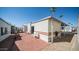 Home exterior with patio and brick walkway at 312 S Emerald Dr, Apache Junction, AZ 85119