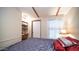 Spacious bedroom with double bed and a built-in workspace at 312 S Emerald Dr, Apache Junction, AZ 85119
