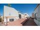 Home exterior with patio and brick walkway at 312 S Emerald Dr, Apache Junction, AZ 85119