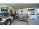 Covered patio with table, chairs, and golf cart at 312 S Emerald Dr, Apache Junction, AZ 85119