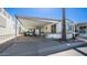 Mobile home with carport and golf cart at 312 S Emerald Dr, Apache Junction, AZ 85119