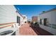 Red brick community walkway between mobile homes at 312 S Emerald Dr, Apache Junction, AZ 85119