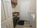 Laundry room with washer, dryer, and cabinets at 15682 W Jenan Dr, Surprise, AZ 85379