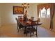 Bright dining room with wood table and chairs, ready for gatherings at 7435 E Sundance Trl # 403, Carefree, AZ 85377