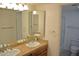 Double sink bathroom with granite countertop and a separate shower at 7435 E Sundance Trl # 403, Carefree, AZ 85377