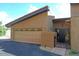 Tan colored garage with attached entry to home at 7435 E Sundance Trl # 403, Carefree, AZ 85377