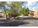 Landscaped entry to the property with a circular driveway at 7435 E Sundance Trl # 403, Carefree, AZ 85377