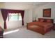 Spacious Primary bedroom with plush bedding and large window at 7435 E Sundance Trl # 403, Carefree, AZ 85377