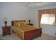Well-lit bedroom with a comfortable bed and ample space at 7435 E Sundance Trl # 403, Carefree, AZ 85377