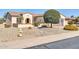 House exterior with landscaping and curb appeal at 16682 W Pacheco Ct, Surprise, AZ 85387