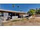 Home features a large backyard with covered patio at 1701 W Highland Ave, Phoenix, AZ 85015