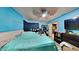 Bedroom with teal bedding and built-in closet at 1701 W Highland Ave, Phoenix, AZ 85015