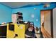 Bedroom with yellow cabinet and hallway view at 1701 W Highland Ave, Phoenix, AZ 85015