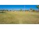 Large grassy park with playground and shaded areas at 1701 W Highland Ave, Phoenix, AZ 85015