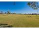 Open green space with soccer field and distant mountains at 1701 W Highland Ave, Phoenix, AZ 85015