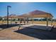 Two shaded picnic areas with grills, perfect for outdoor gatherings at 1701 W Highland Ave, Phoenix, AZ 85015