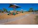 Shaded playground with slides, climbing structures, and play area at 1701 W Highland Ave, Phoenix, AZ 85015