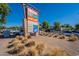 Shopping center signage with various stores listed at 1701 W Highland Ave, Phoenix, AZ 85015