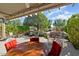 Relaxing backyard patio with seating area and a water feature at 17807 N Navarro Ct, Surprise, AZ 85374