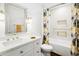 Updated bathroom with a bathtub, shower, and marble vanity at 9701 W Oak Ridge Dr, Sun City, AZ 85351