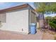 Neat side yard with a trash can and brick pavement at 1509 E Indian Wells Dr, Chandler, AZ 85249