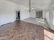 Spacious dining area with chandelier and tile floors at 563 S 230Th Ave, Buckeye, AZ 85326