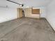 Two-car garage with built-in cabinets and storage at 563 S 230Th Ave, Buckeye, AZ 85326