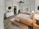 Main bedroom with ensuite bathroom and a relaxing sitting area at 563 S 230Th Ave, Buckeye, AZ 85326