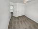 Bedroom with double door closet and view of kitchen at 563 S 230Th Ave, Buckeye, AZ 85326