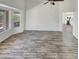 Living room with backyard views and tile flooring at 563 S 230Th Ave, Buckeye, AZ 85326