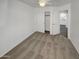 Bedroom with neutral carpet, ceiling fan and access to closet at 563 S 230Th Ave, Buckeye, AZ 85326