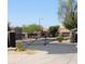 Gated community entrance with a security gate at 26 S Quinn Cir # 7, Mesa, AZ 85206