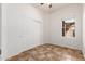Bedroom with tile flooring and sliding door closet at 26 S Quinn Cir # 7, Mesa, AZ 85206