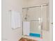 Shower with glass enclosure and tiled walls at 26 S Quinn Cir # 7, Mesa, AZ 85206