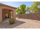 Landscaped backyard with gravel and rock pathway at 26 S Quinn Cir # 7, Mesa, AZ 85206