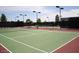Well-maintained tennis courts for residents' enjoyment at 20620 N Confetti Ct, Maricopa, AZ 85138