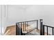 Open loft area with wood-look floors and a spiral staircase at 4220 N 32Nd St # 4, Phoenix, AZ 85018