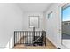 Modern open spiral staircase with metal railing and light wood floors at 4220 N 32Nd St # 4, Phoenix, AZ 85018